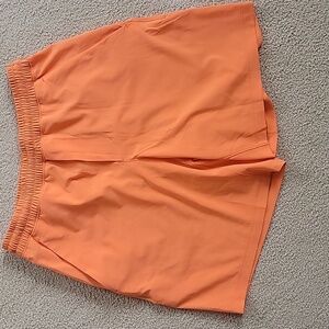 Lululemon Pace Breaker Linerless Short  7" Rush Orange